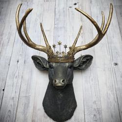 Faux taxidermy deer head, painted slate grey with antique gold accents. The antlers are antique gold and a vintage inspired Santos star crown rests atop the deers head.