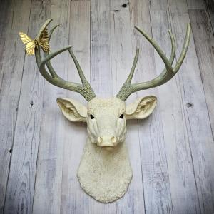 faux taxidermy deer head wall mount, painted antique white with gold and italian sage accents, the antlers are italian sage with gold accents.