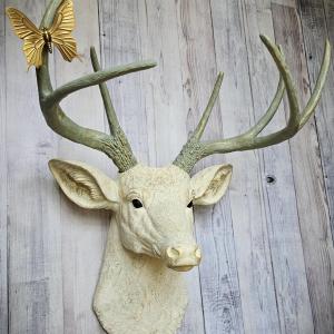 faux taxidermy deer head wall mount, painted antique white with gold and italian sage accents, the antlers are italian sage with gold accents