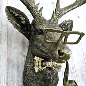 faux taxidermy deer head with glassses, bow tie and pipe, frankie stag
