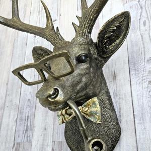 faux taxidermy deer head with glassses, bow tie and pipe, frankie stag