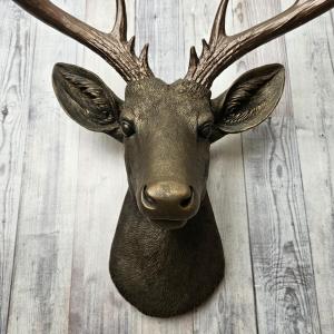 Faux taxidermy deer head painted chestnut brown with dark copper accents and dark copper antlers.