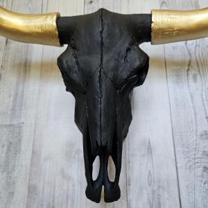faux taxidermy steer skull, painted black with gold horns