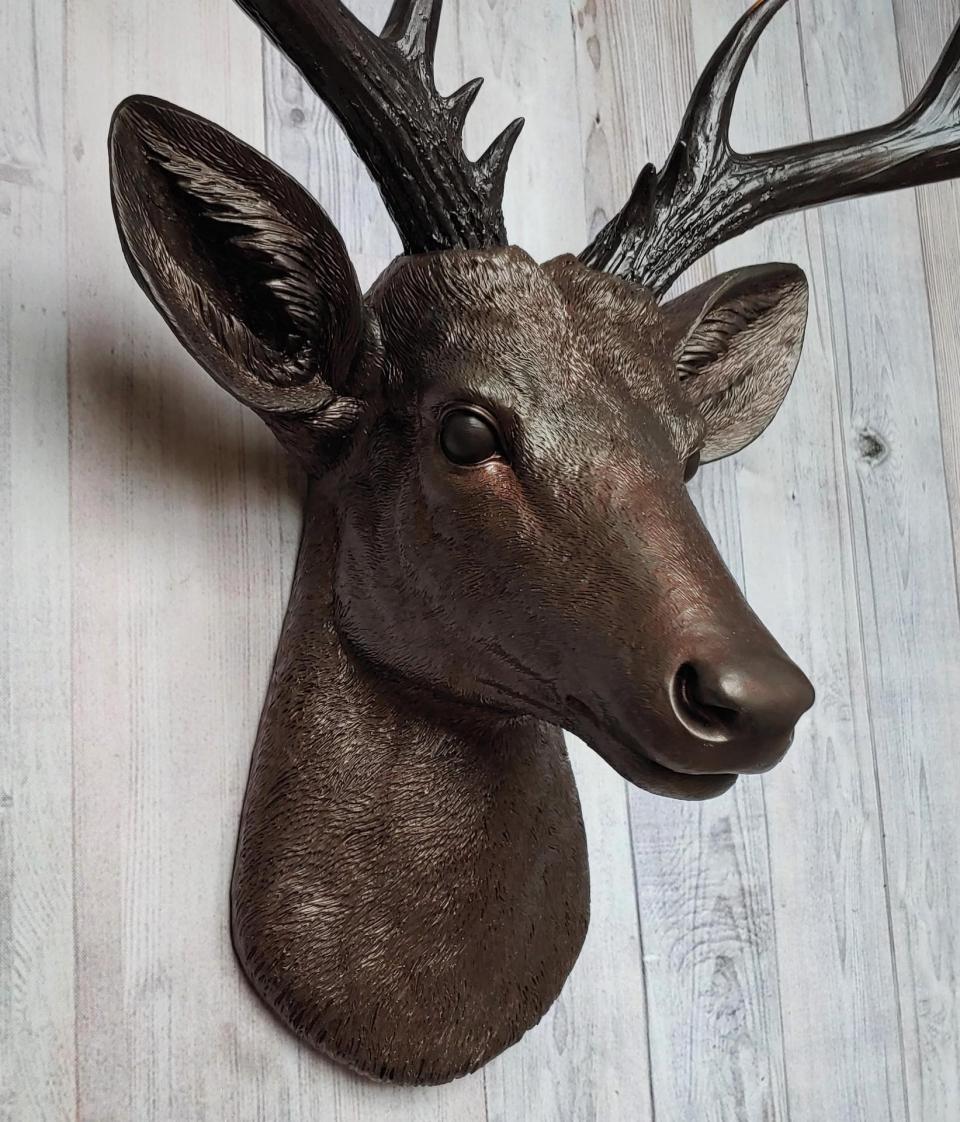 Faux taxidermy deer head, painted dark copper with dark rubbed bronze accents and dark rubbed bronze antlers.
