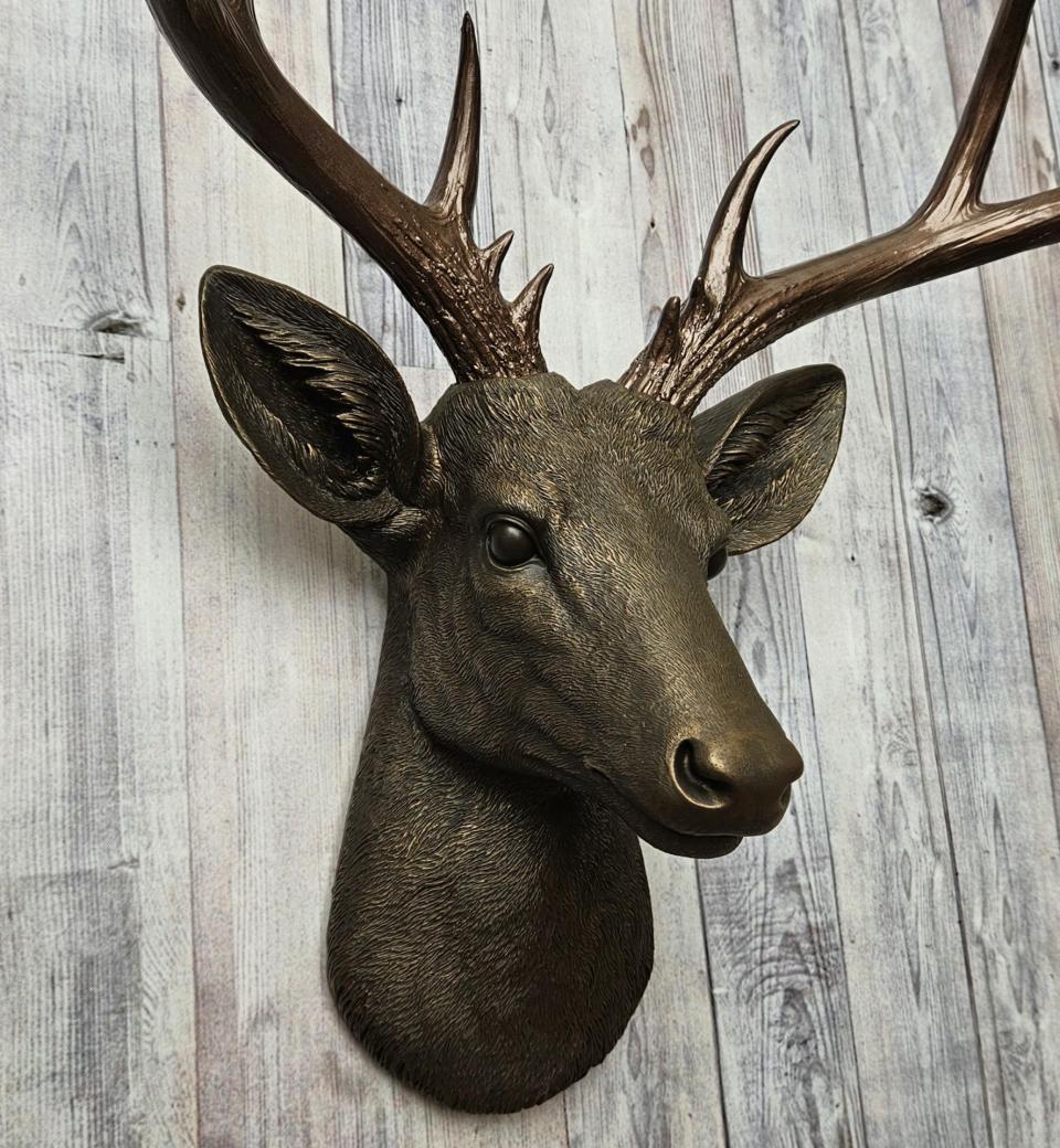 Faux taxidermy deer head painted chestnut brown with dark copper accents and dark copper antlers.