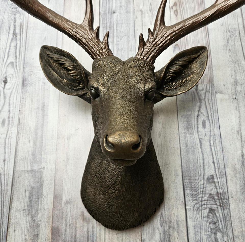 Faux taxidermy deer head painted chestnut brown with dark copper accents and dark copper antlers.
