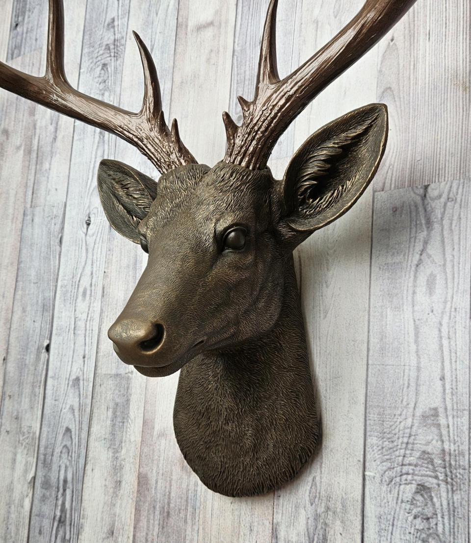 Faux taxidermy deer head painted chestnut brown with dark copper accents and dark copper antlers.