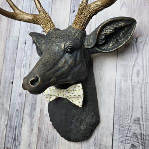 Faux taxidermy deer head, painted slate grey with antique gold accents. 